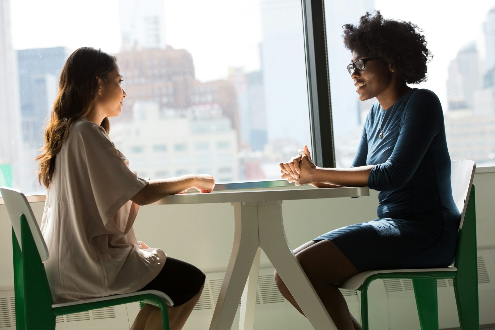 Two women in an easy conversation